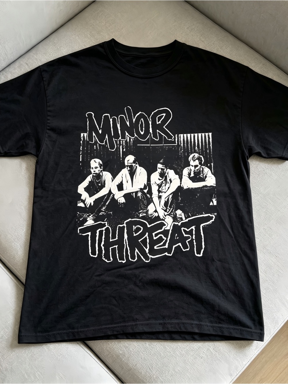 Minor Threat graphic of four men with the words 'MINOR THREAT' t-shirt Unisex